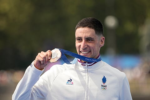 Men's individual triathlon: Bronze medalist France's Leo Bergere